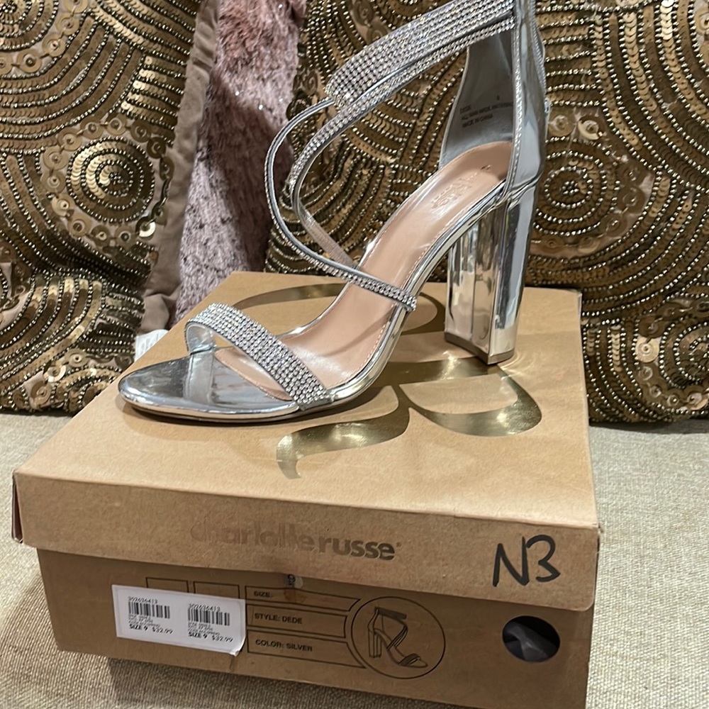 Silver Bling strap oh sandal. Charlotte Russe. Never worn. New with tags. Size9